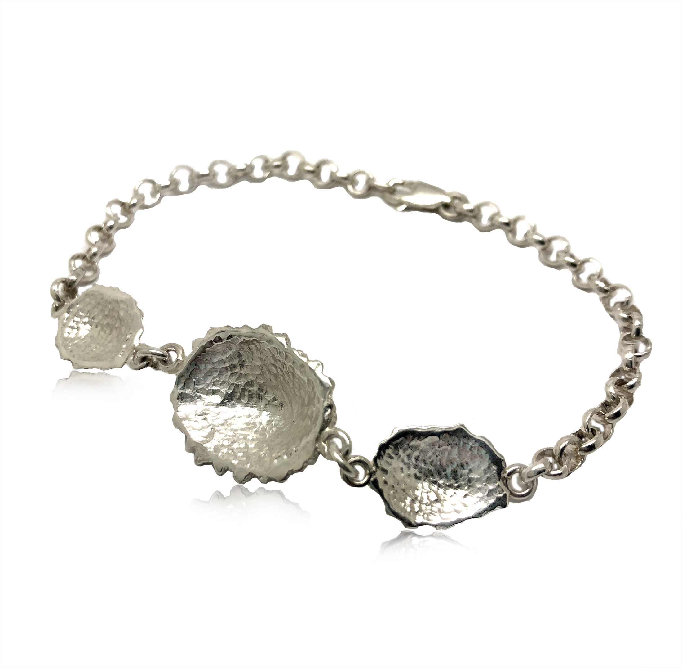 Silver sea shell bracelet with three limpets